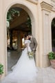 Wedding couple standing at Bella Collina Atrium