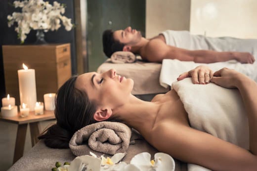 Couple enjoying a treatment at the Spa at Bella Collina