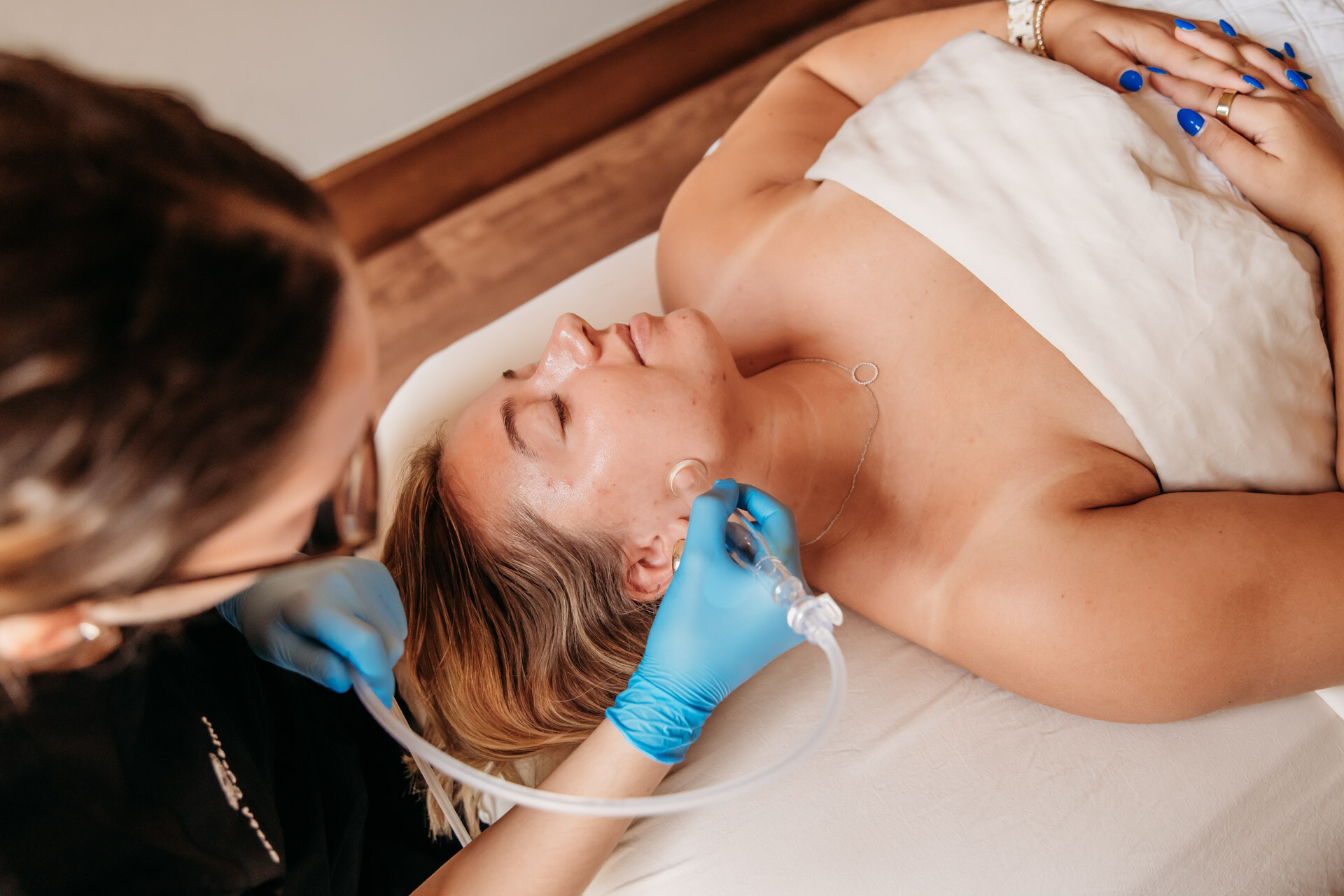 Woman receiving a Platinum HydraFacial at The Spa at Bella Collina
