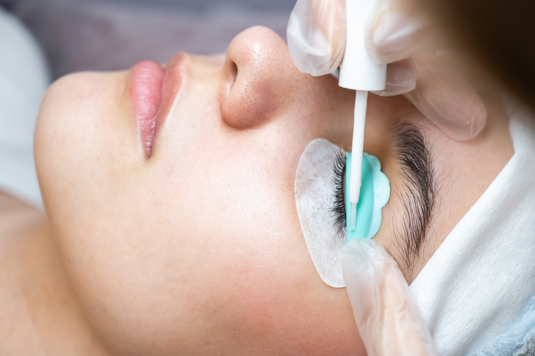 Woman getting her eyelashes tinted at the Spa at Bella Collina