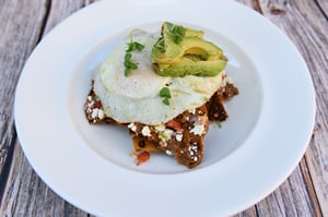 Chiaquiles_Corn_Tortillas_Egg_Refried_Beans_Avacado_Queso_Fresco
