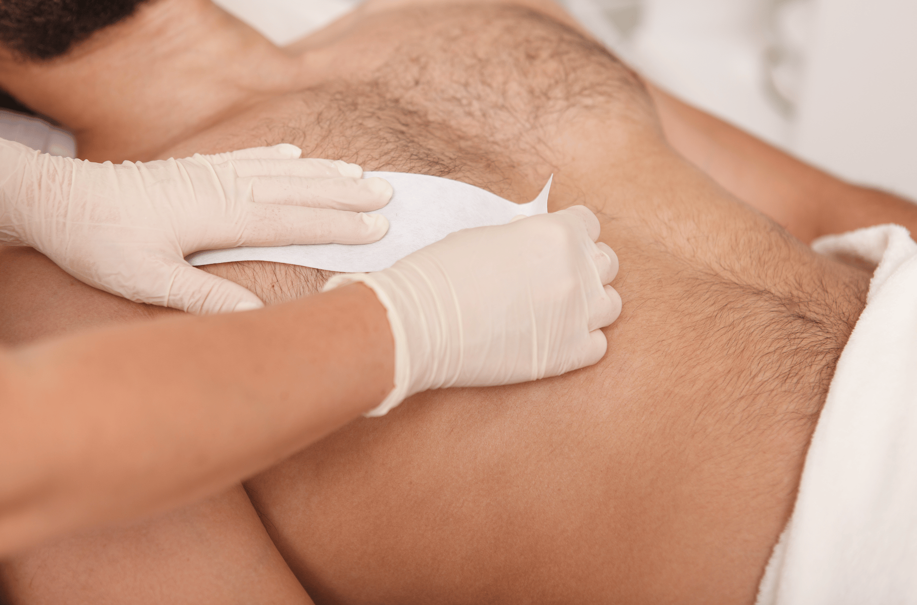 Man getting his chest waxed at the Spa at Bella Collina