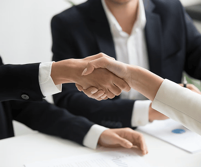 Business professionals shaking hands during a meetingsmall-image (2)