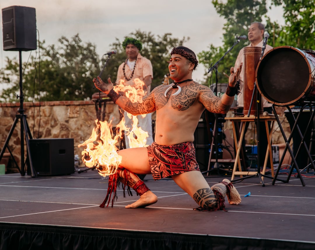 Fire dancer at Bella Collina luau event