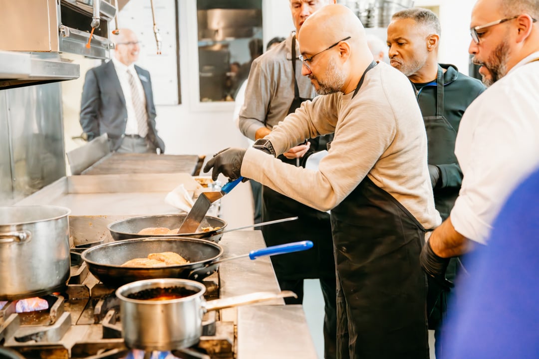 Chef cooking food at Bella Collina