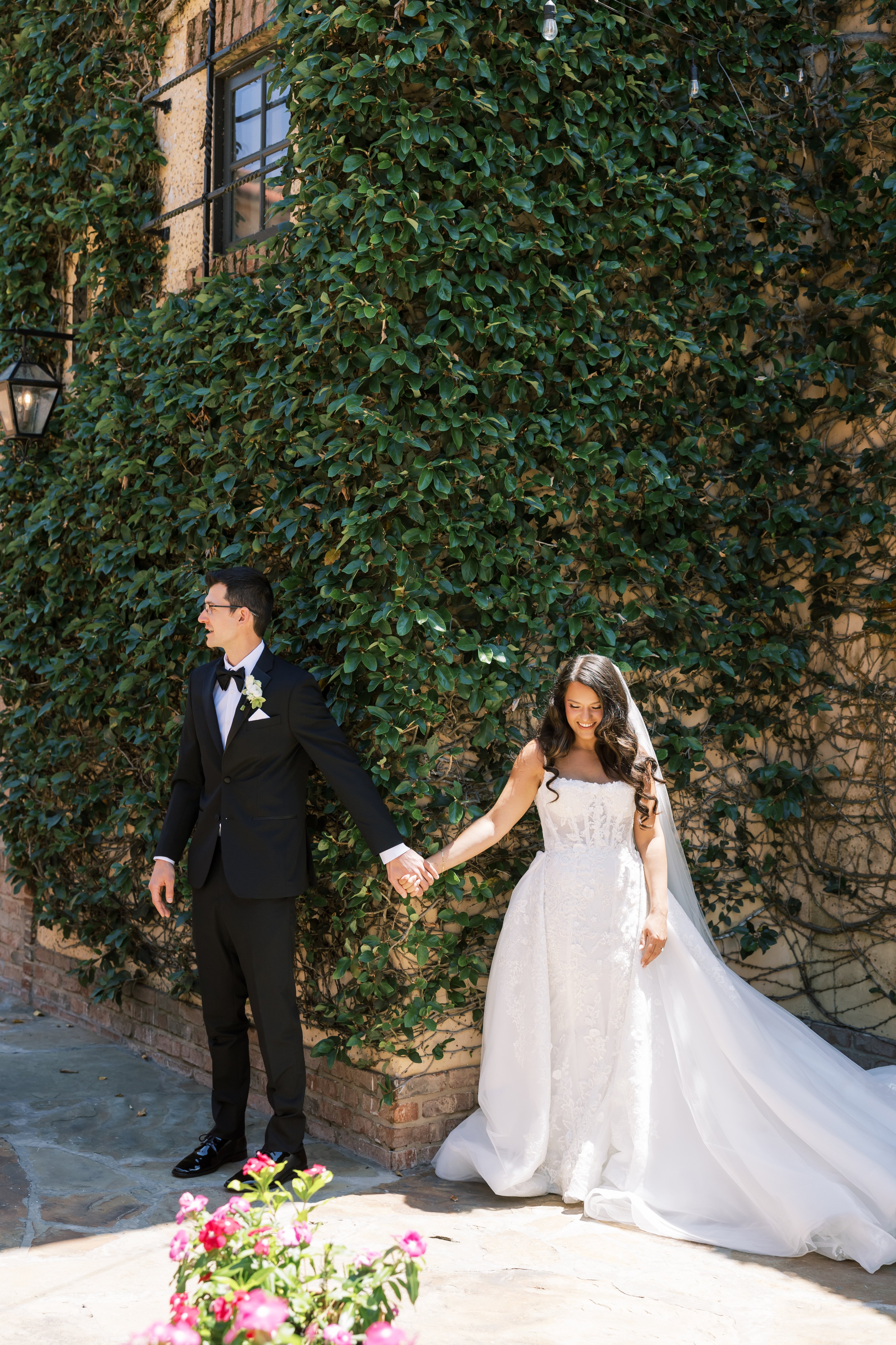 Bella Collina wedding couple holding hands after first look