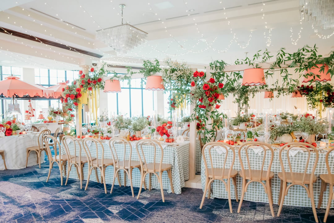 Seating with floral arrangements in Ballroom at Bella Collina