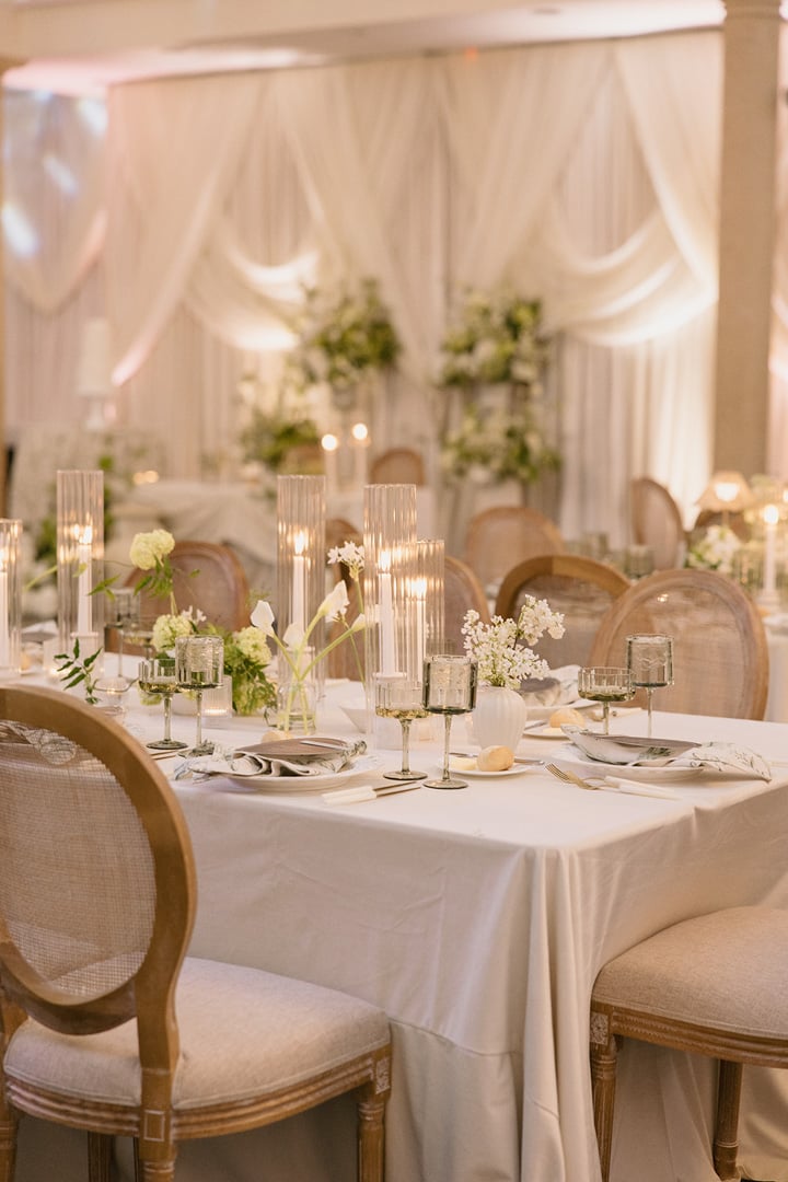 Table setting with candles for Ballroom event at Bella Collina