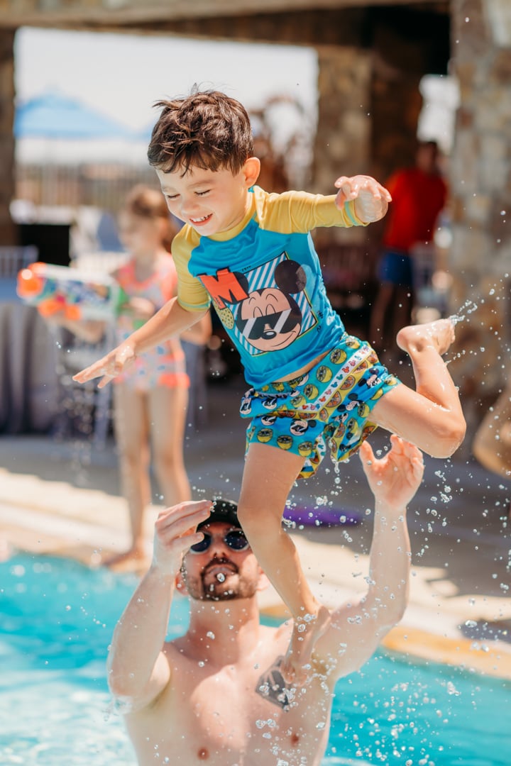 Boy Jumping in at La Piscina Pool Party
