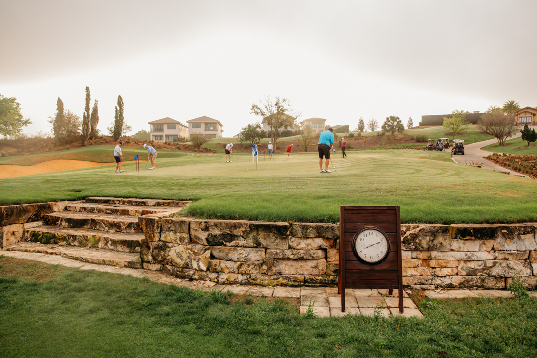 Golfers on Bella Collina practice area