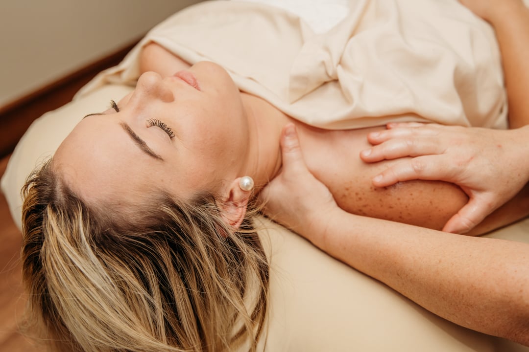 Woman Getting Lomi Lomi Massage