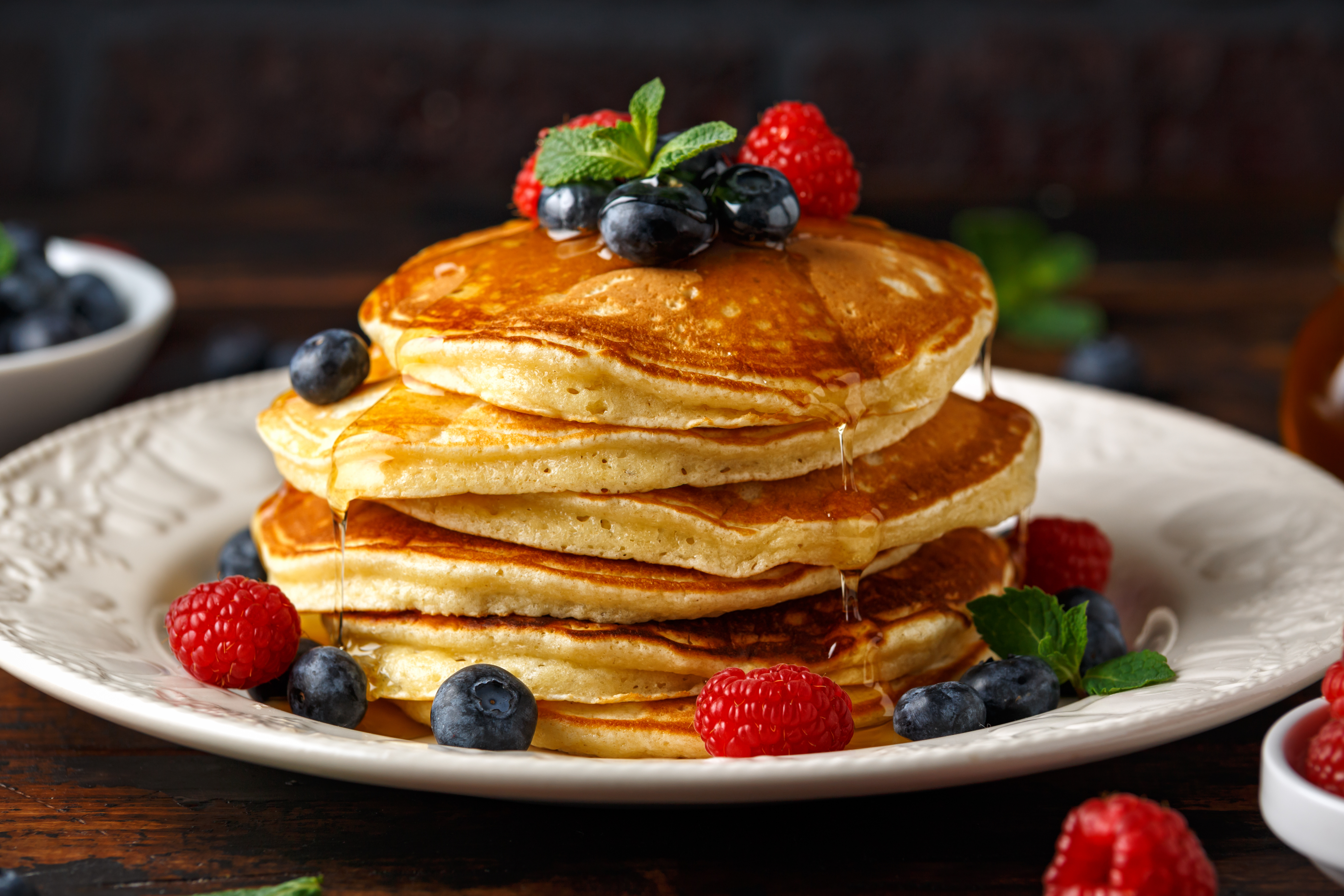 Pancakes with syrup and fresh fruit